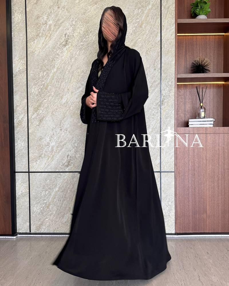 Black abaya embroidered with a royal touch