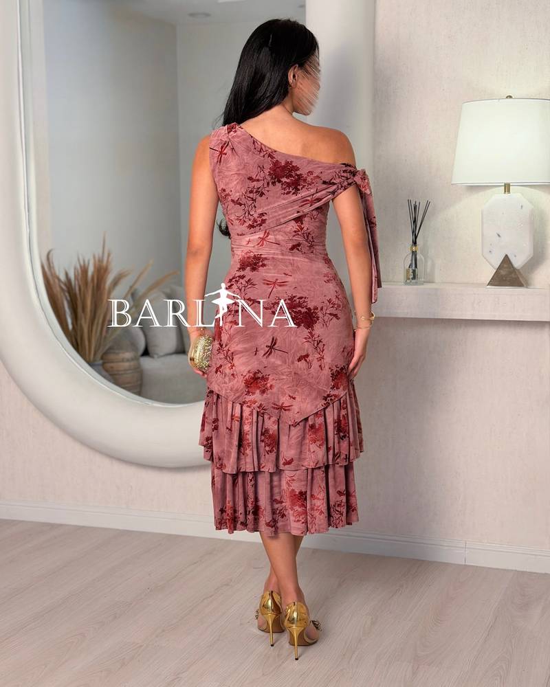 A soft midi dress with an elegant floral print