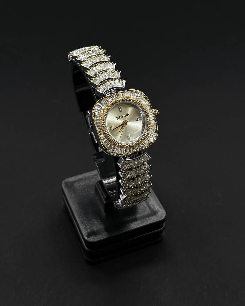 watch with a rounded square frame adorned with crystals
