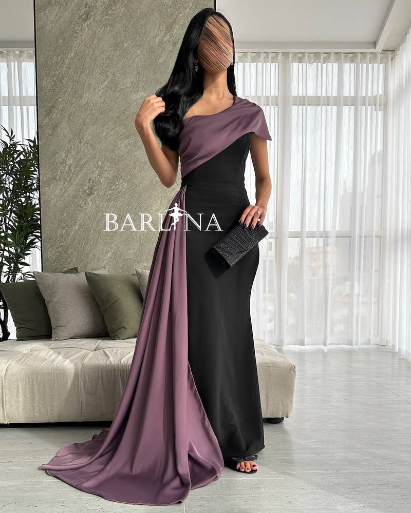 Black evening dress with shoulder and purple shawl
