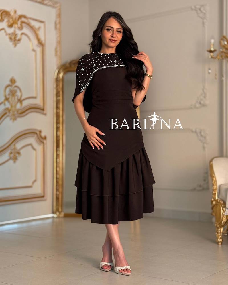Brown midi dress with a short embellished cape