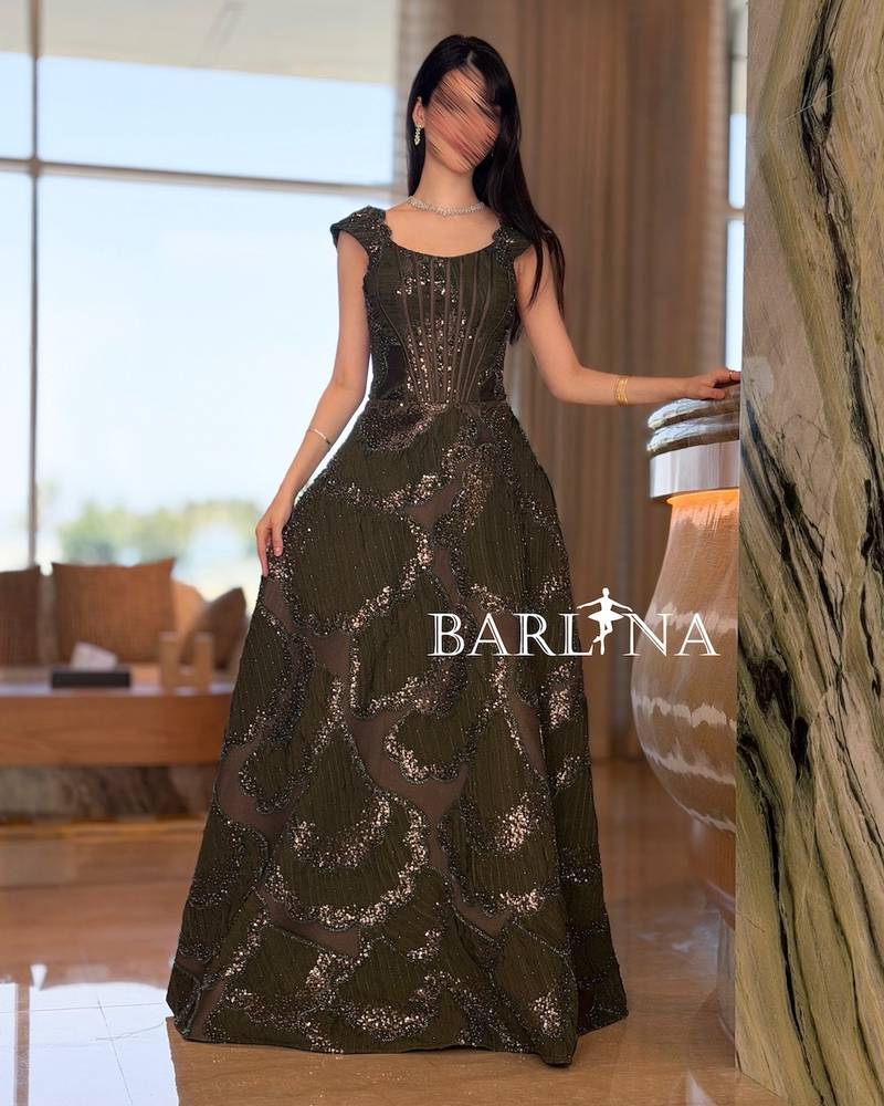 Luxurious olive evening dress with intricate embroidery
