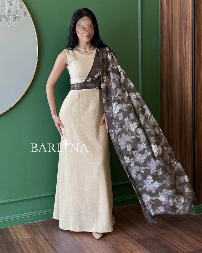 Elegant beige dress with floral sleeves