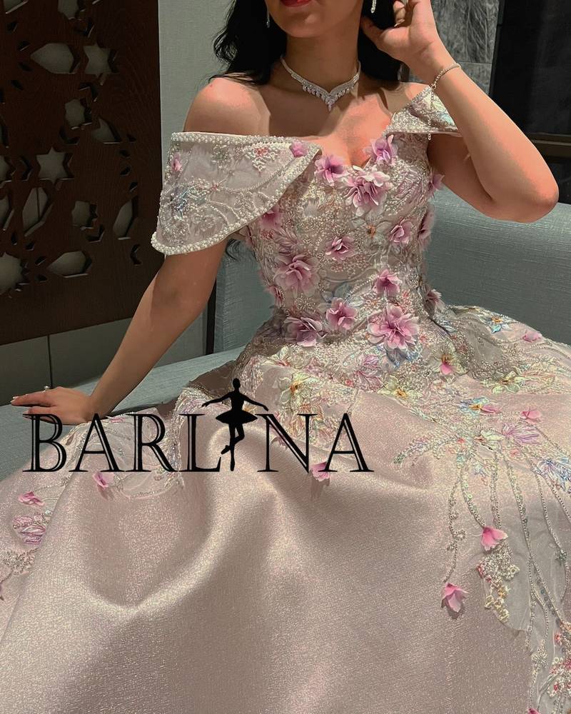 Pink evening dress decorated with elegant beads and embroidery