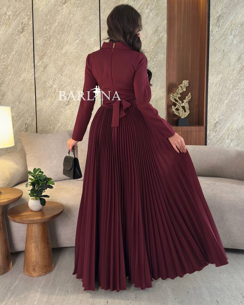 maroon dress with pleated folds