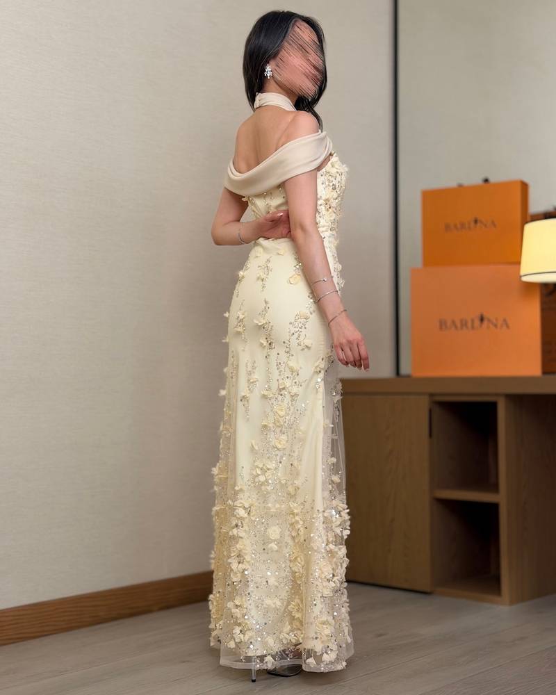 Ivory evening dress with a wrap halter neckline