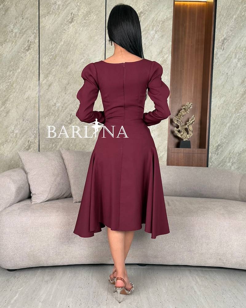Oudi midi dress with a wide cut