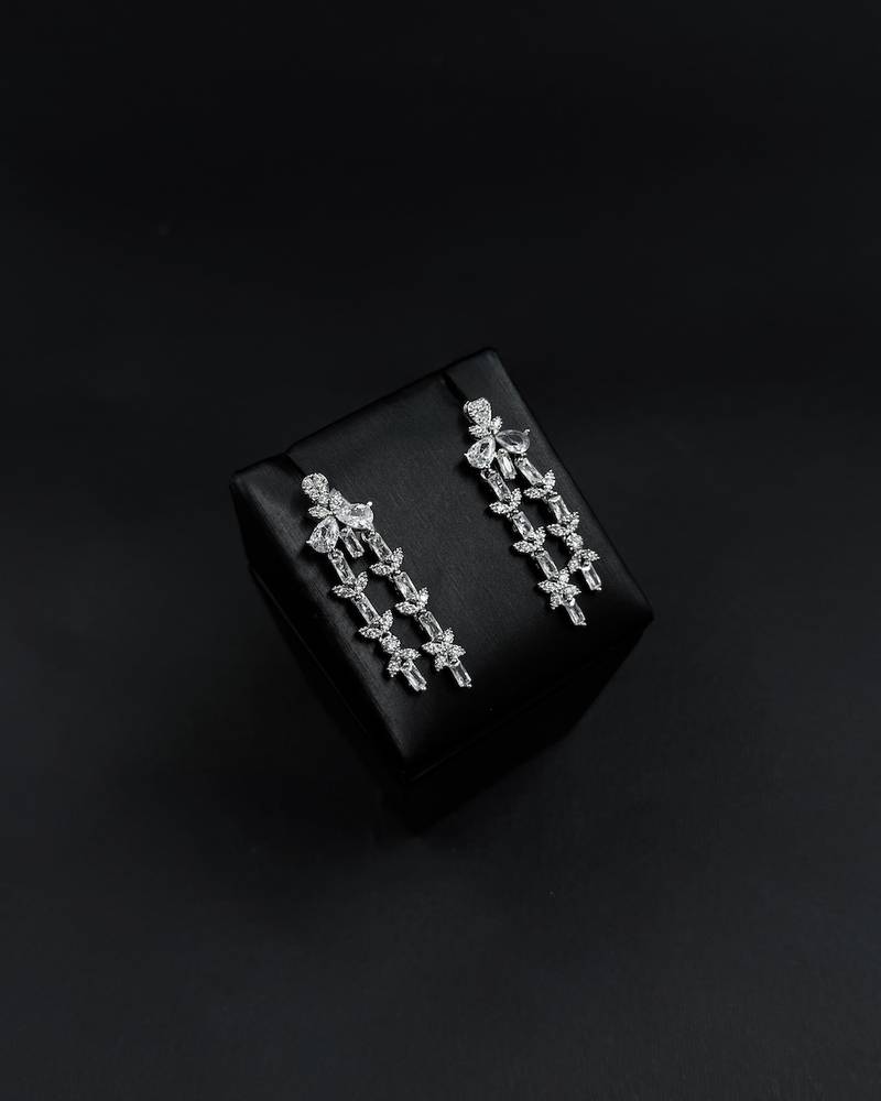 Elegant accessory set with dangling, studded details