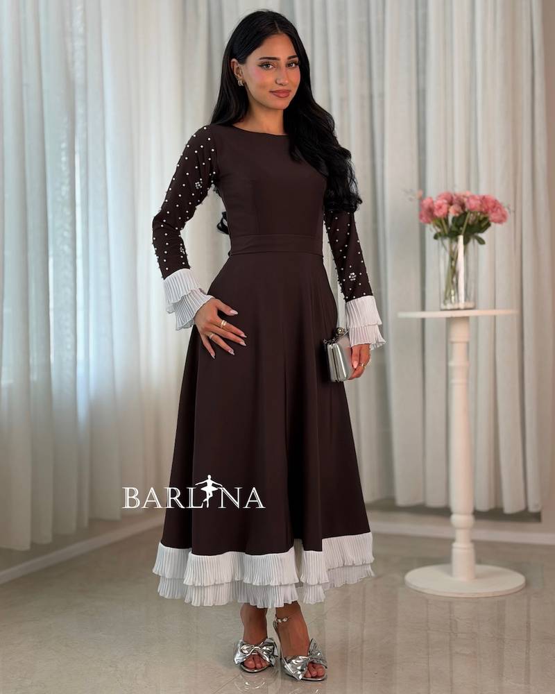 Brown midi dress with pearl-embellished sleeves