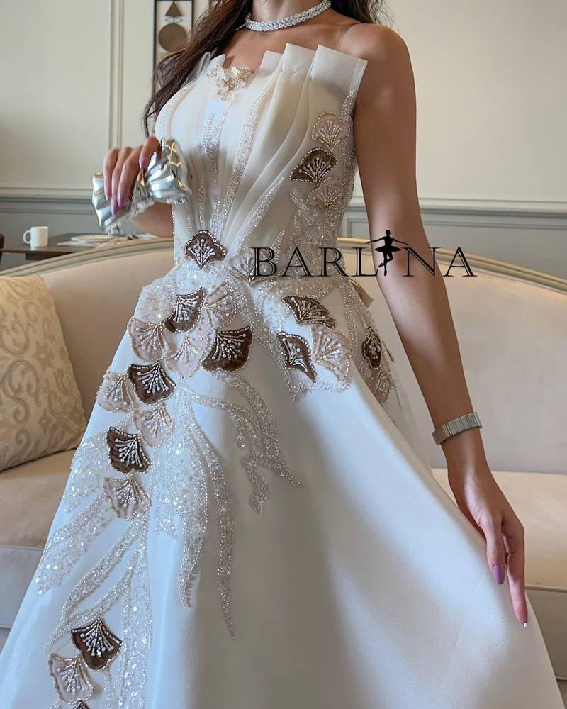Off white evening dress with brown embellishments