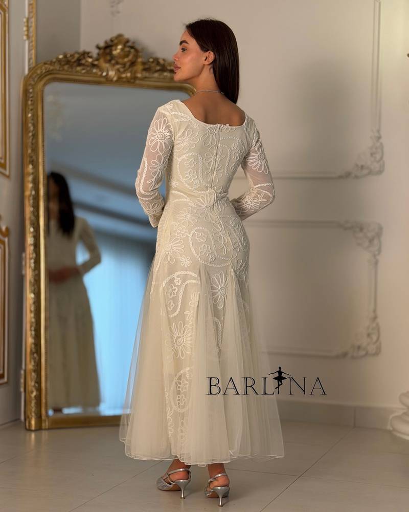 Soft white tulle dress with lace embroidery