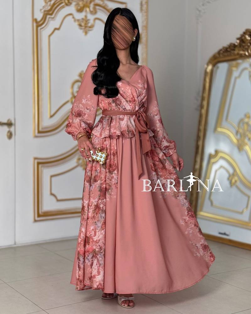 Floral pink set with a ruffled waist and flowing skirt