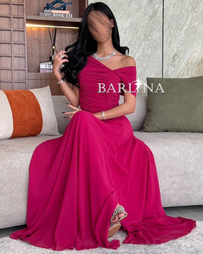 Elegant long ofF-the-shoulder dress in fuchsia