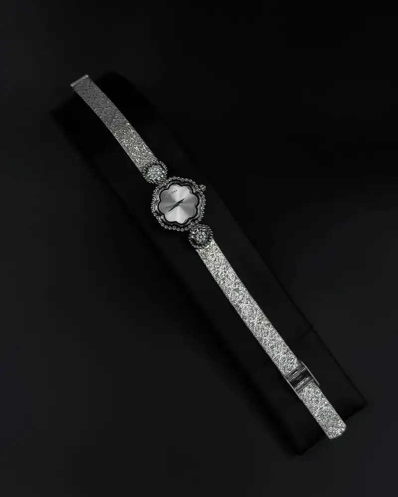 A delicate women's watch with an elegant floral design