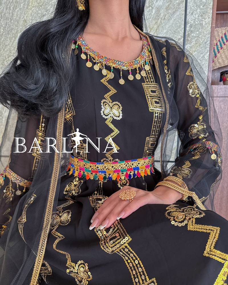 Black jalabiya with gold embroidery and transparent abaya