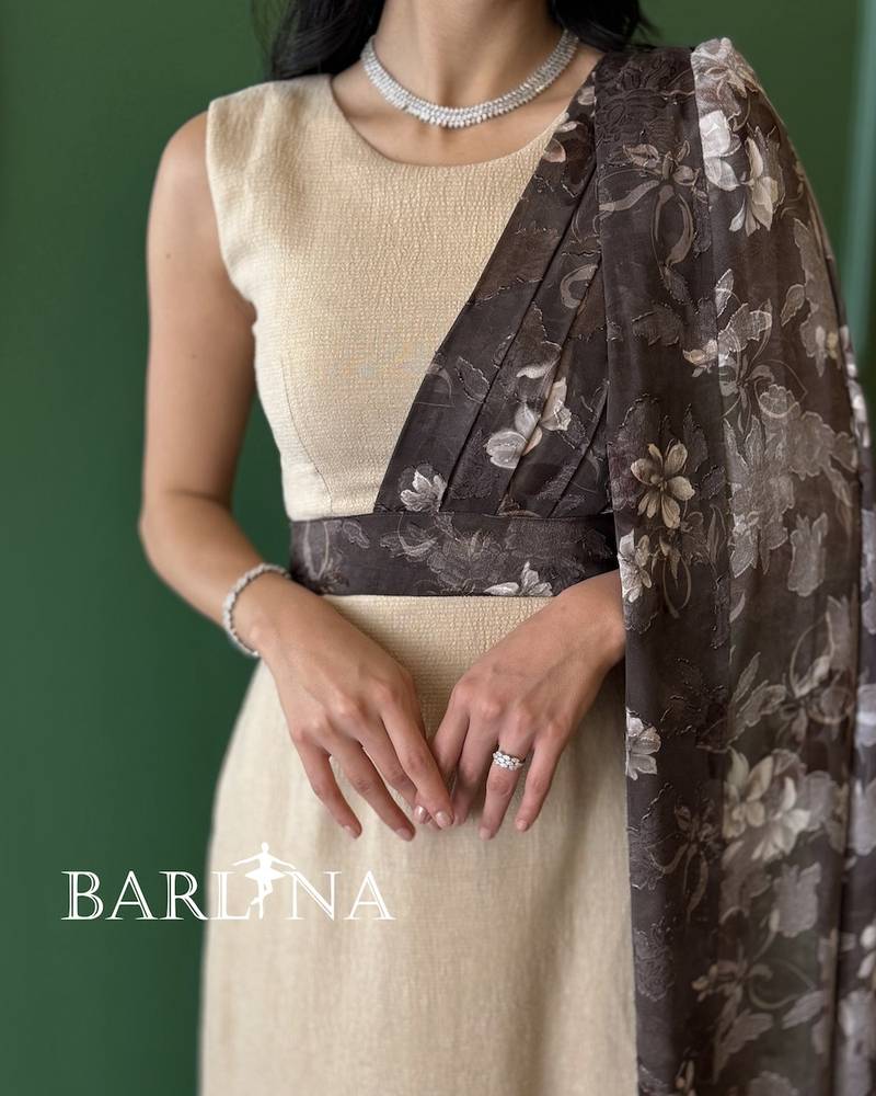Elegant beige dress with floral sleeves
