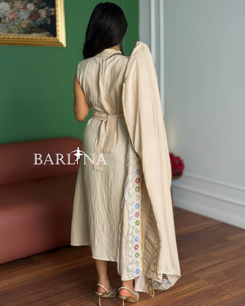 Beige jalabiya with colorful circular embroidery
