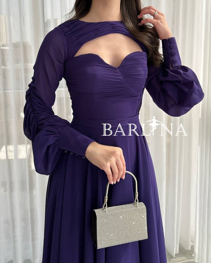 Royal purple dress with slit at the chest
