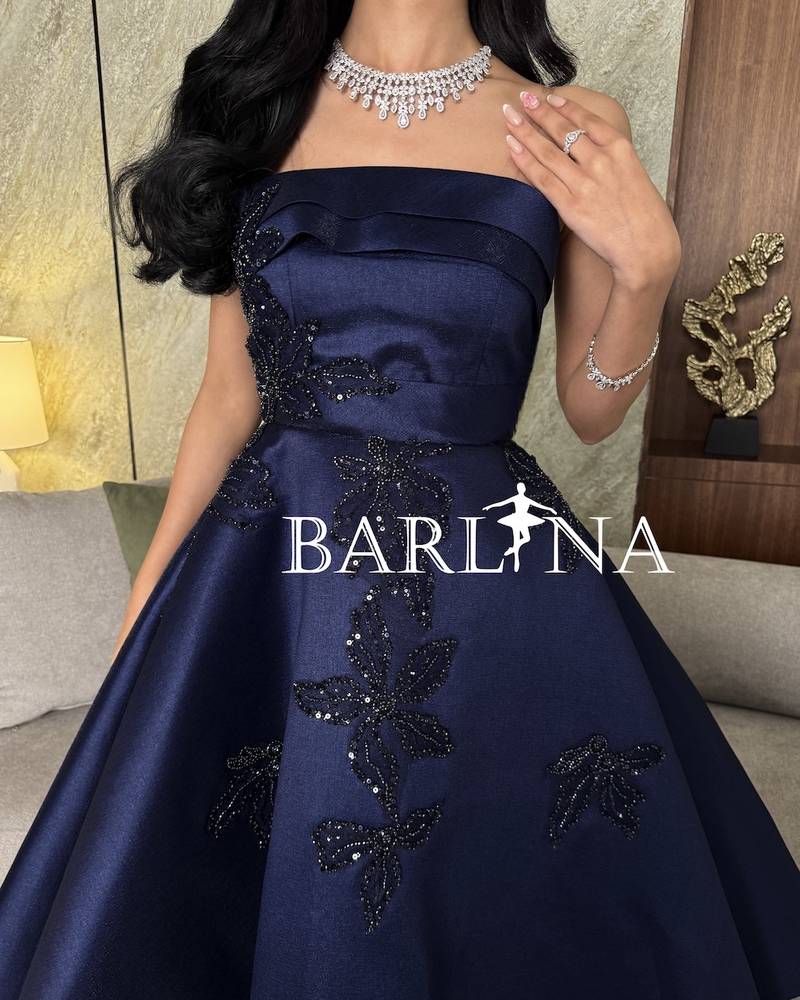 Navy blue off-the-shoulder dress with luxurious embroidery