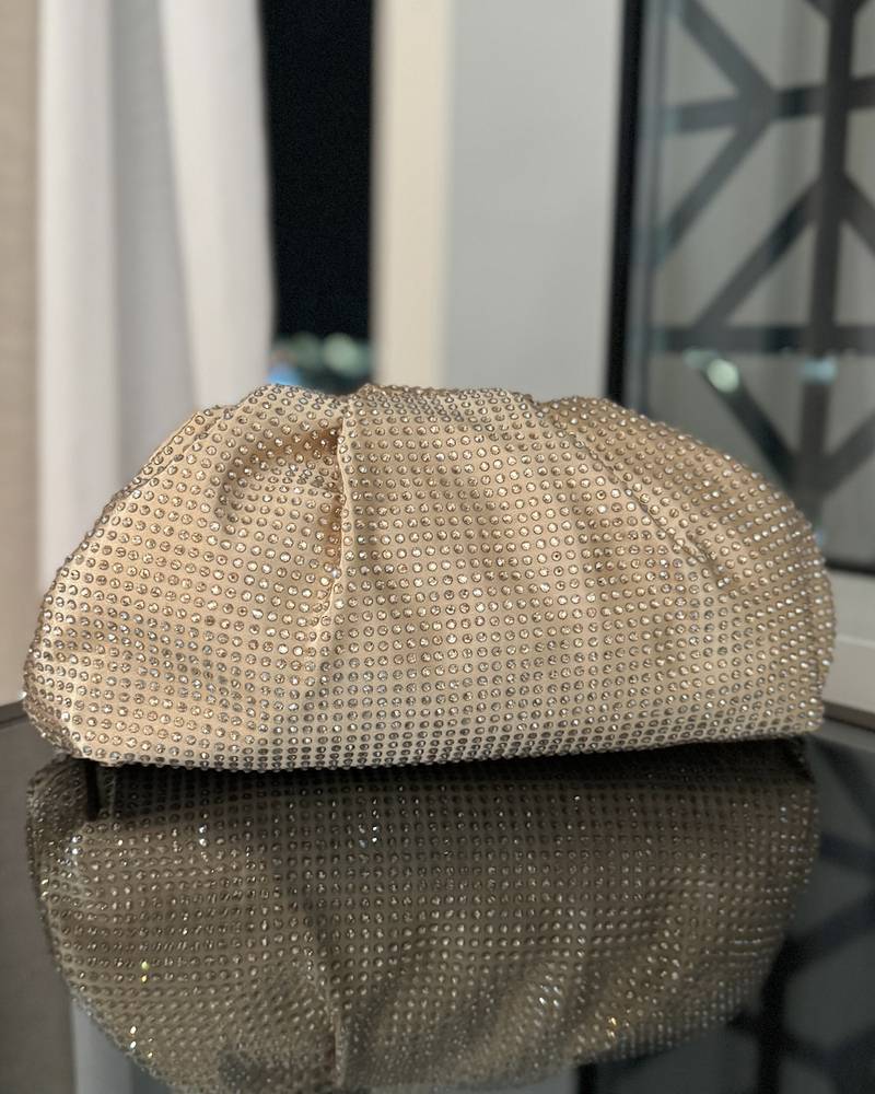 Shiny puffy clutch-style bag