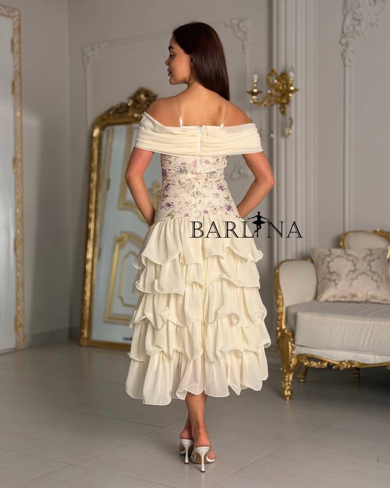 Off-white floral dress with layered underskirts