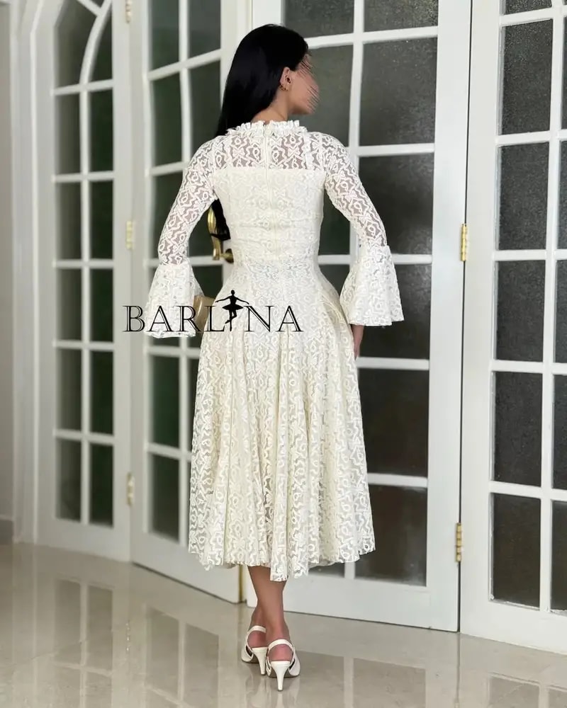 A soft dress adorned with elegant lace patterns
