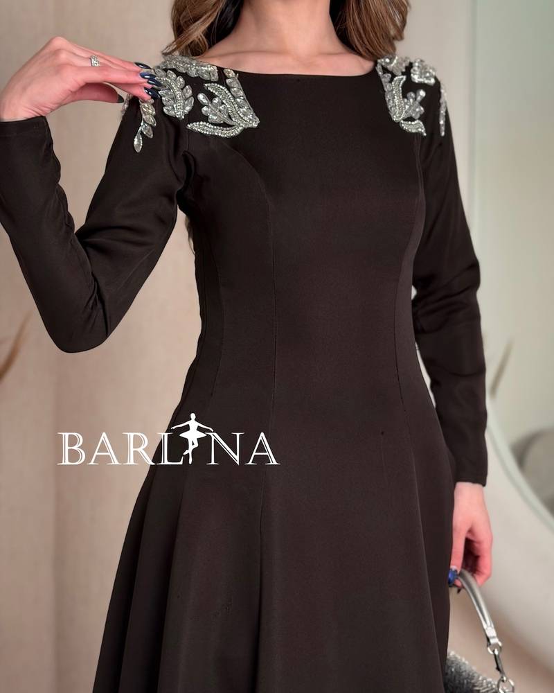 Dark brown dress with embroidery on the shoulders