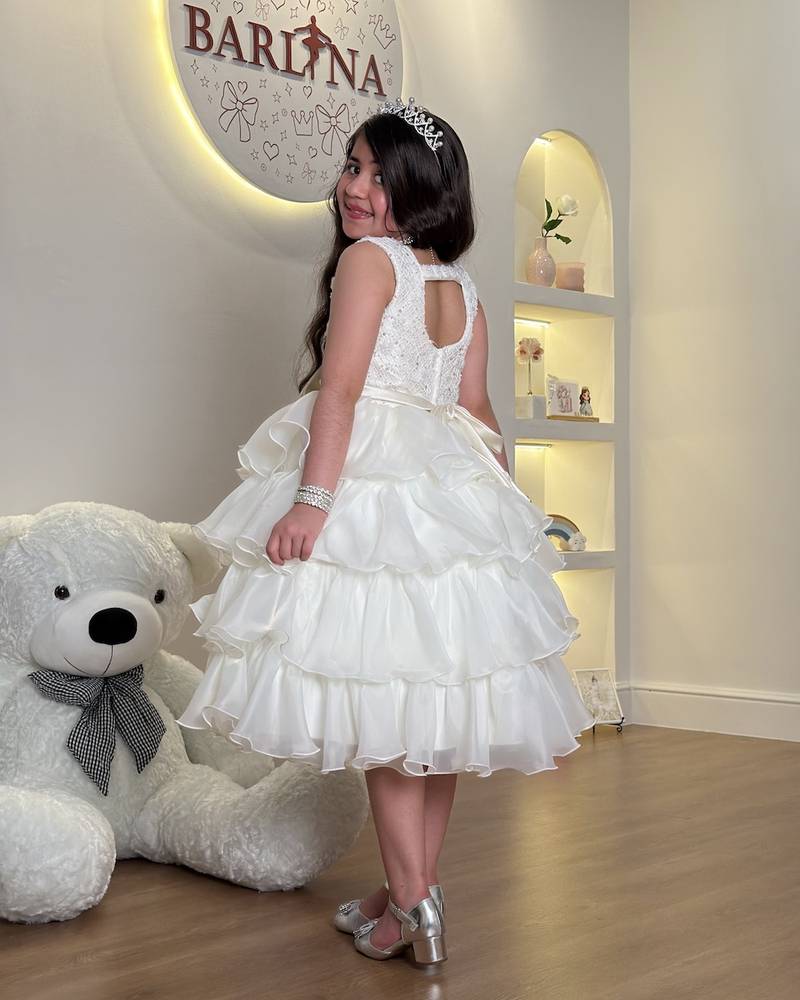 Girls' dress with puffy cream-colored layers