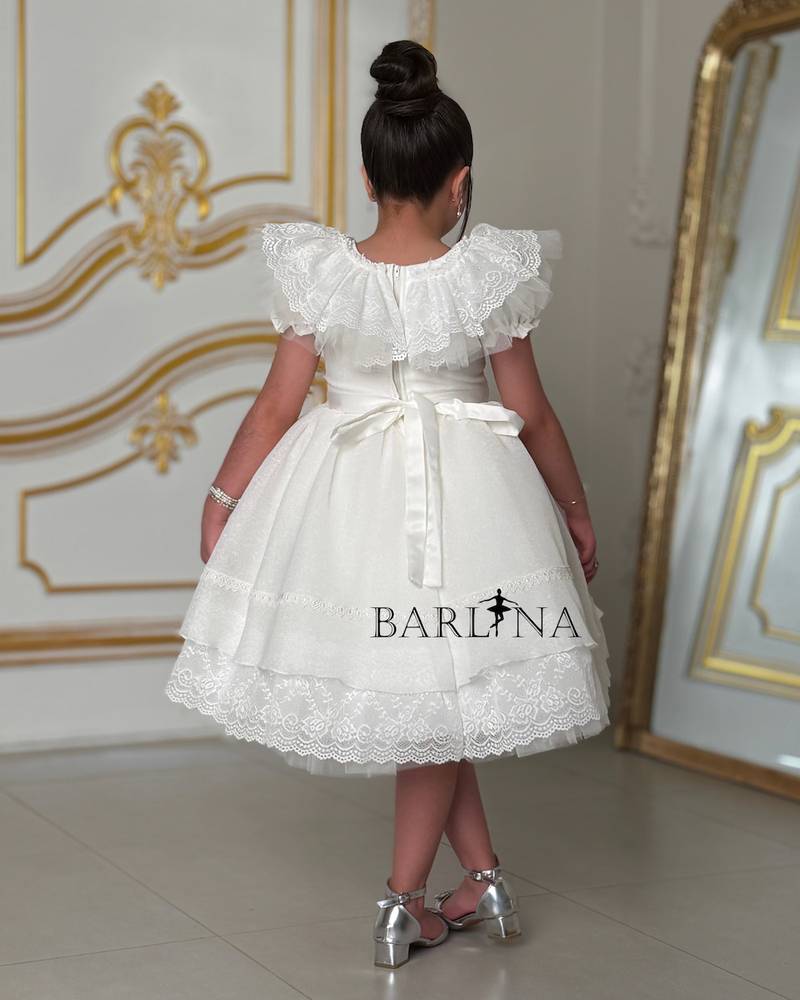 white fluffy girl's dress with lace details