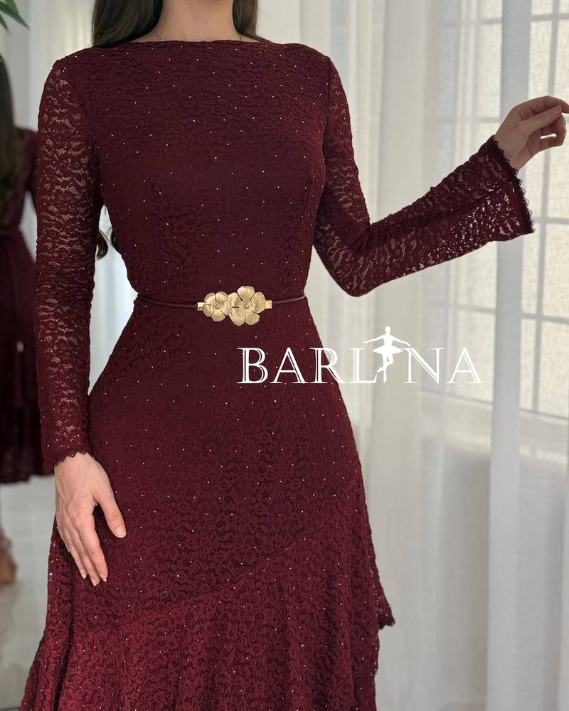 Feminine burgundy lace dress with a gold belt