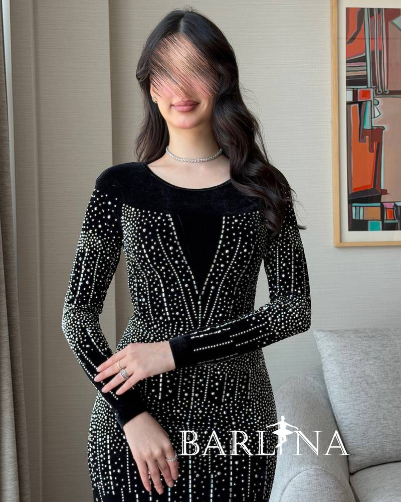 Black velvet dress embroidered with matching crystals