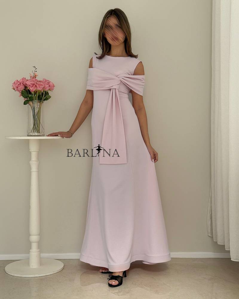 Pink dress with a wide bow at the chest