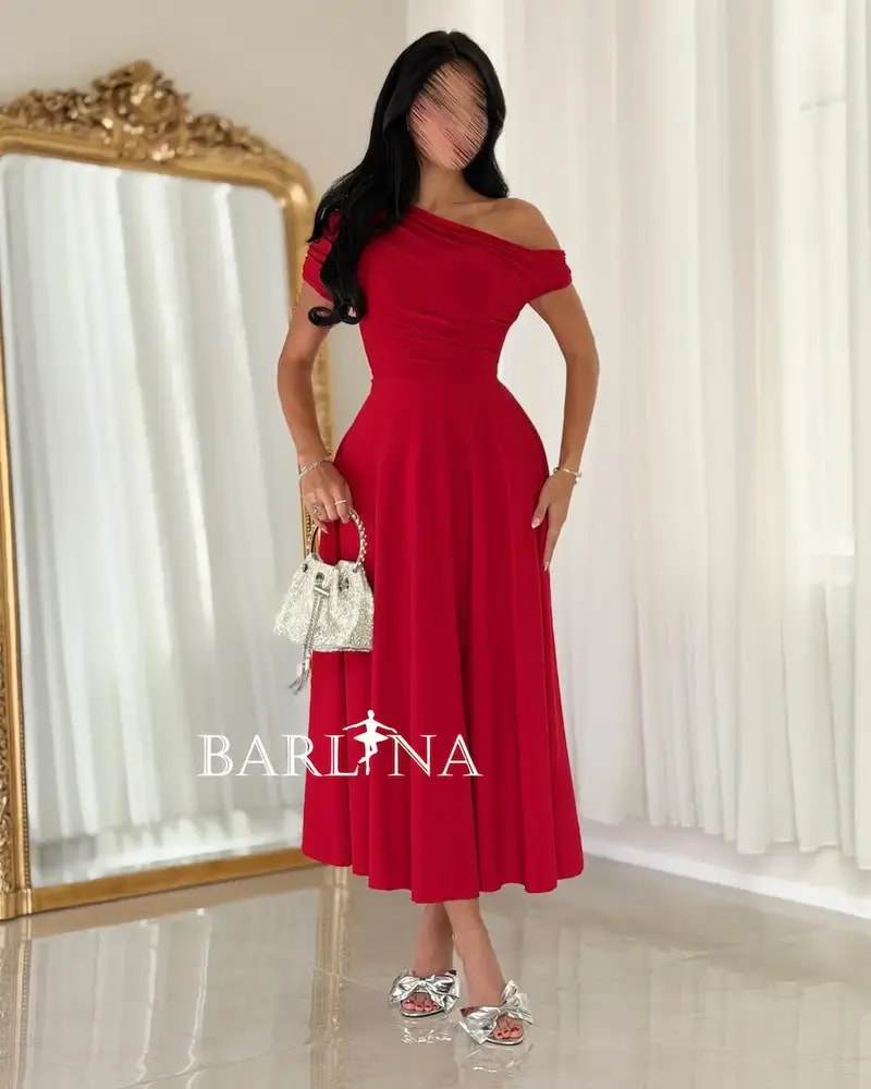 A soft and elegant red midi dress