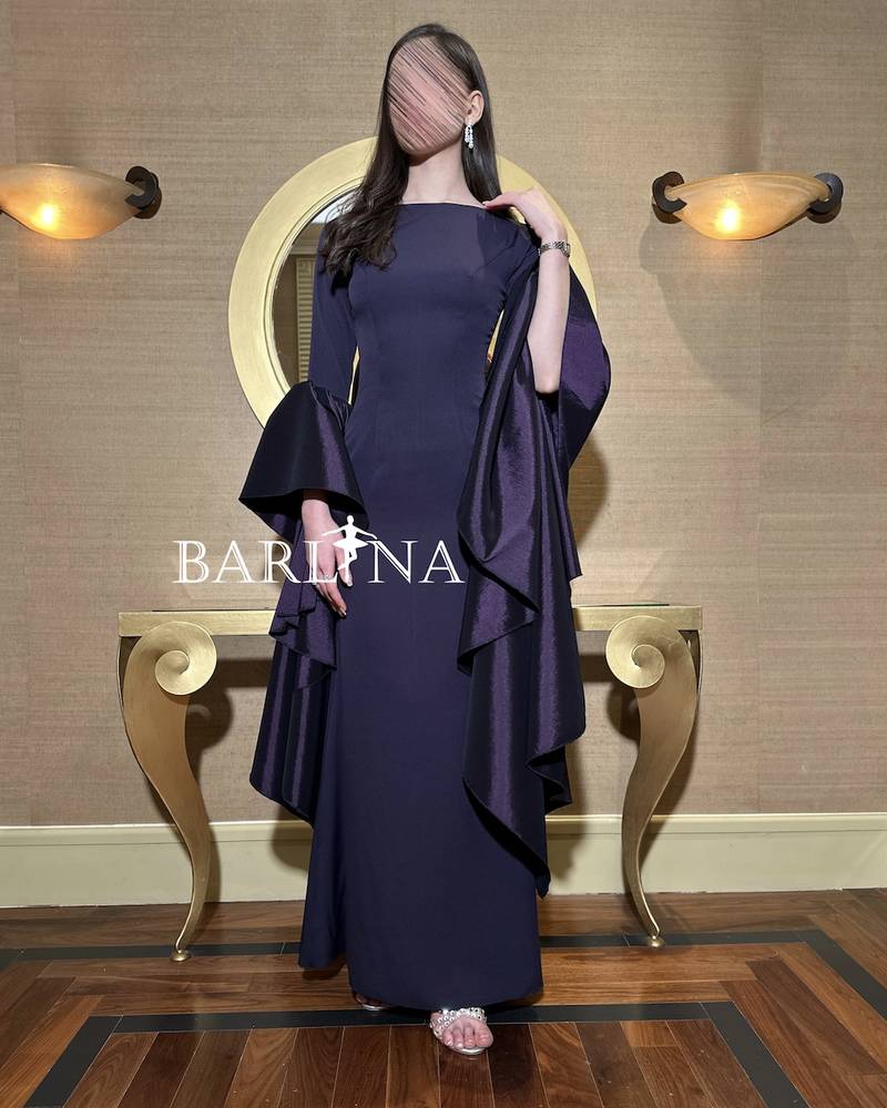 Navy blue dress with distinctive wide sleeves