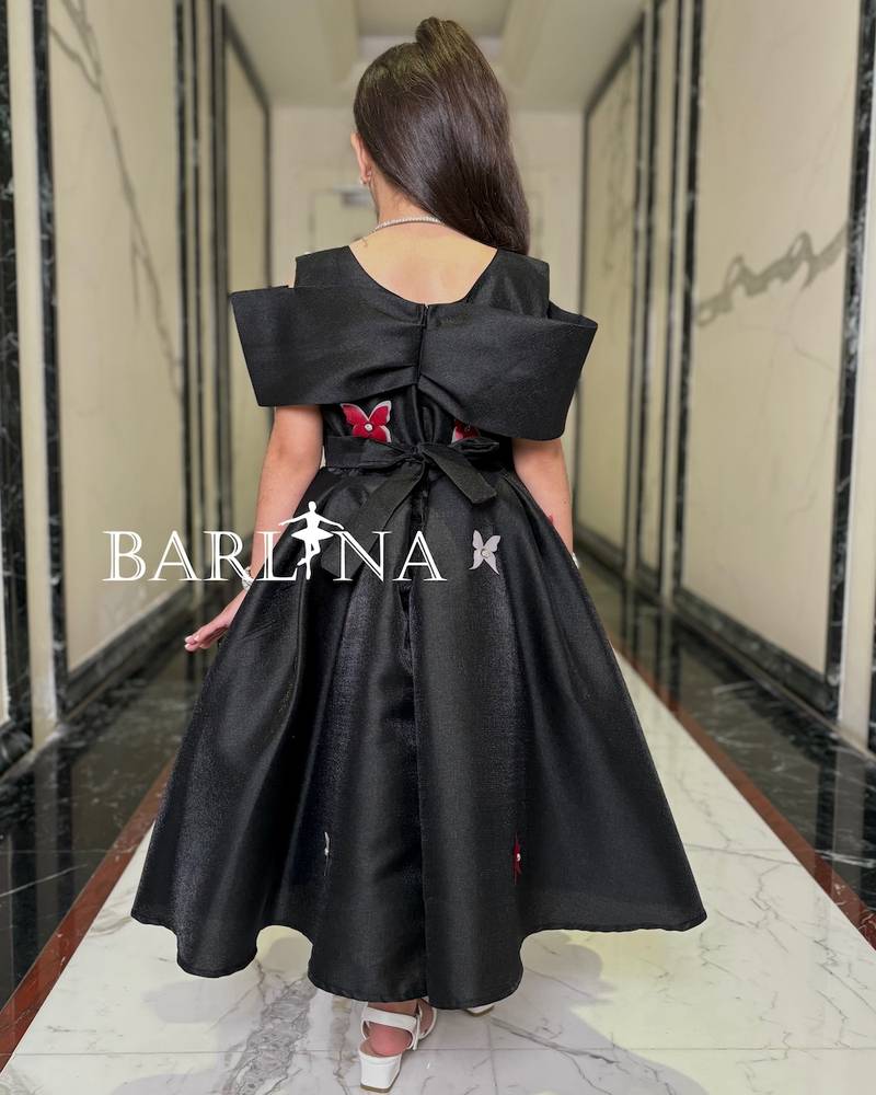 Girls' black off-shoulder dress with butterflies