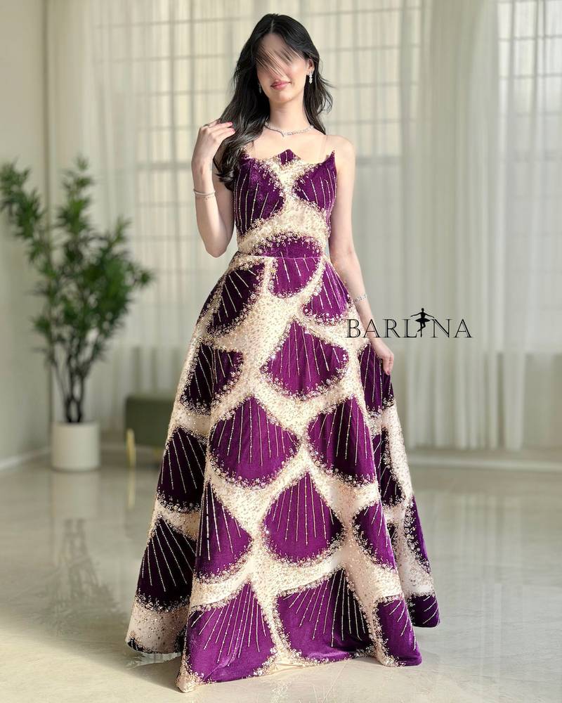 Beige evening dress with shimmering purple embroidery