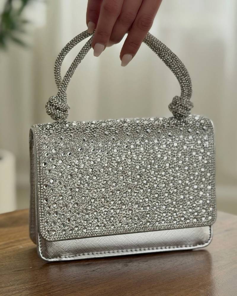 Evening handbag with a knotted top handle