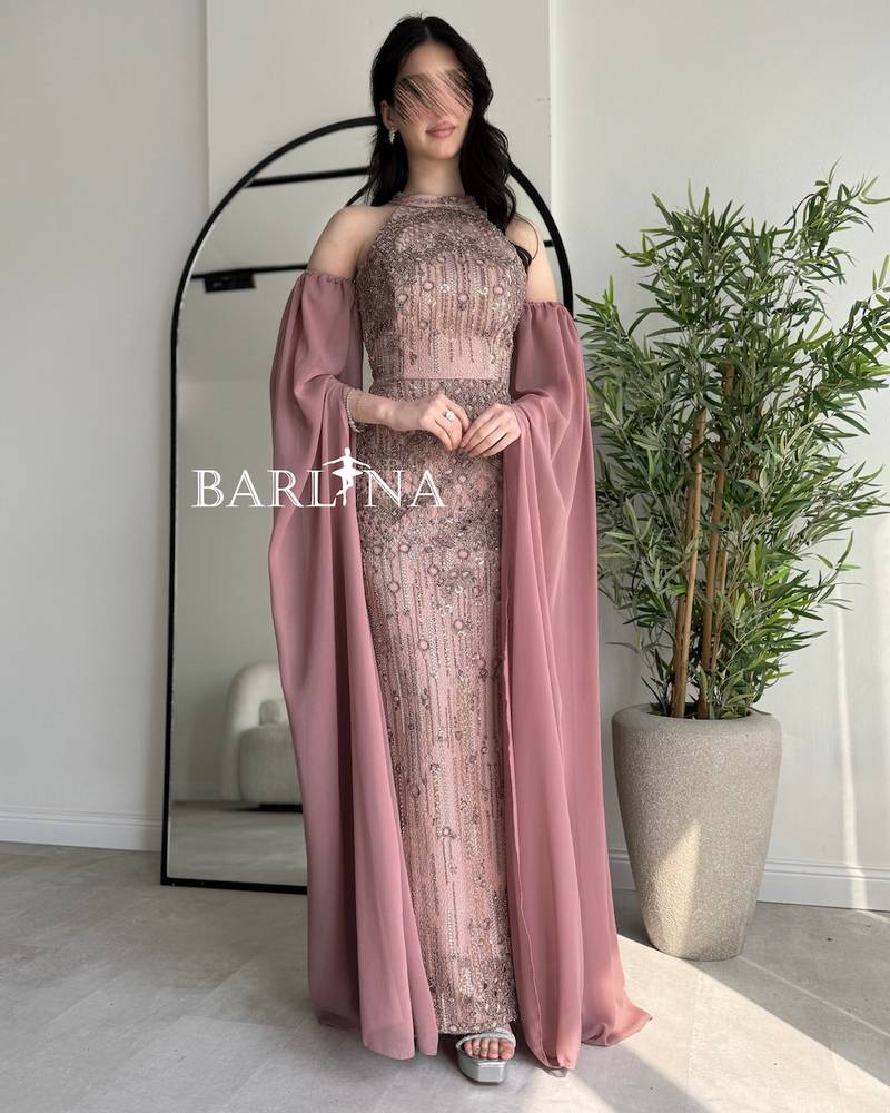 Nude dress with long off-shoulder sleeves