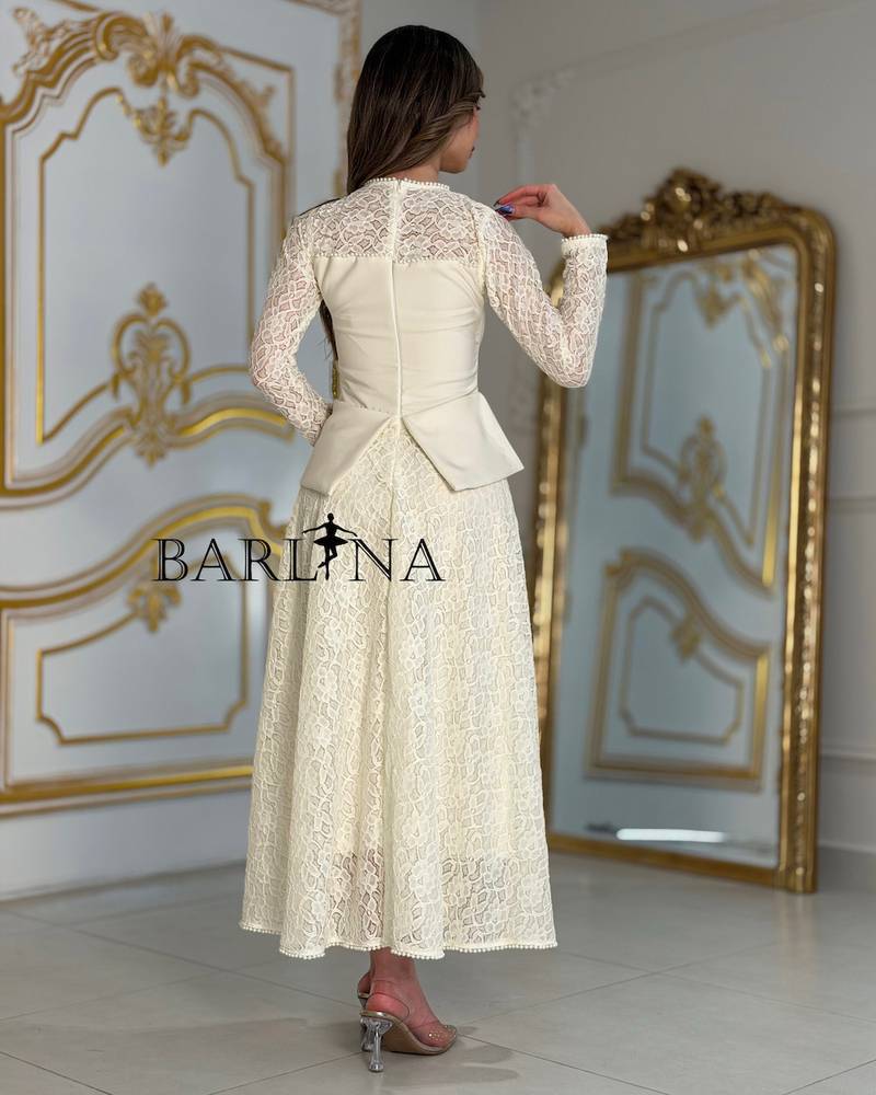 Off white lace dress with an elegant design