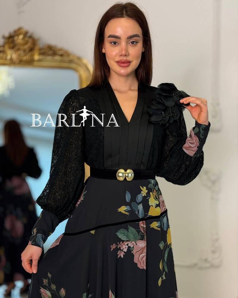 Long black floral dress with a belt