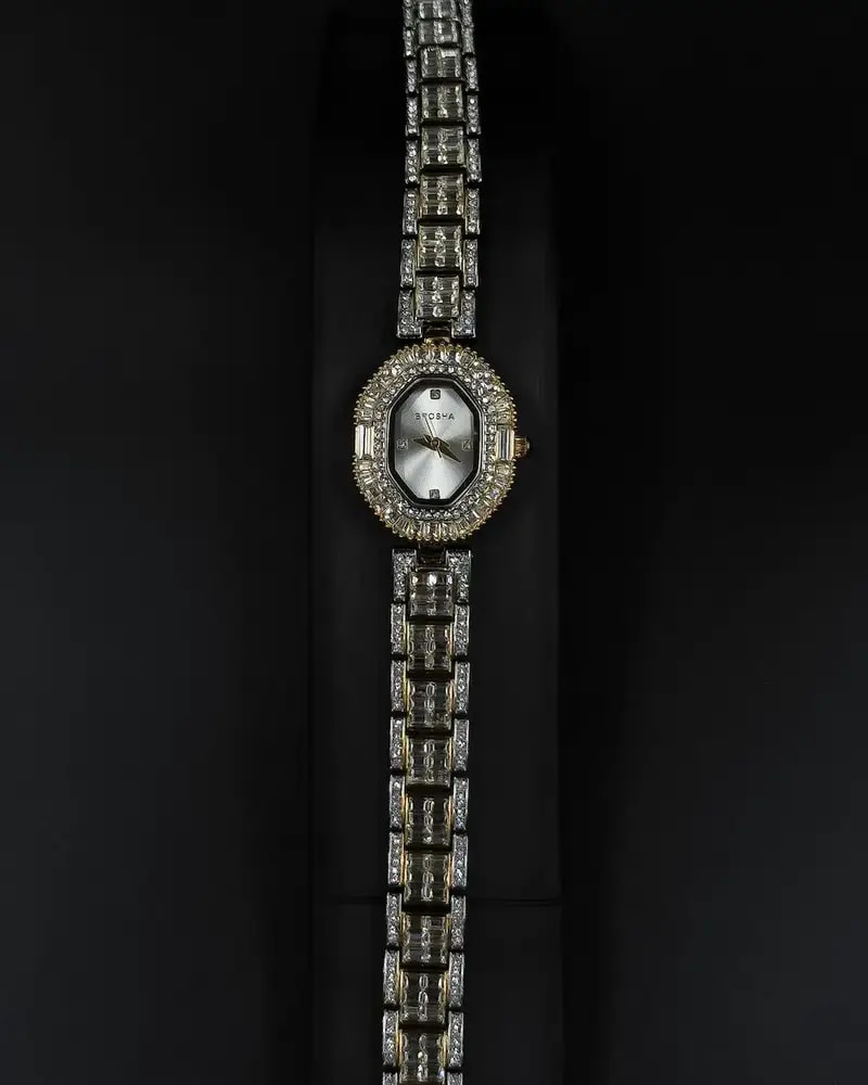 Women's evening watch with a sparkling crystal bezel
