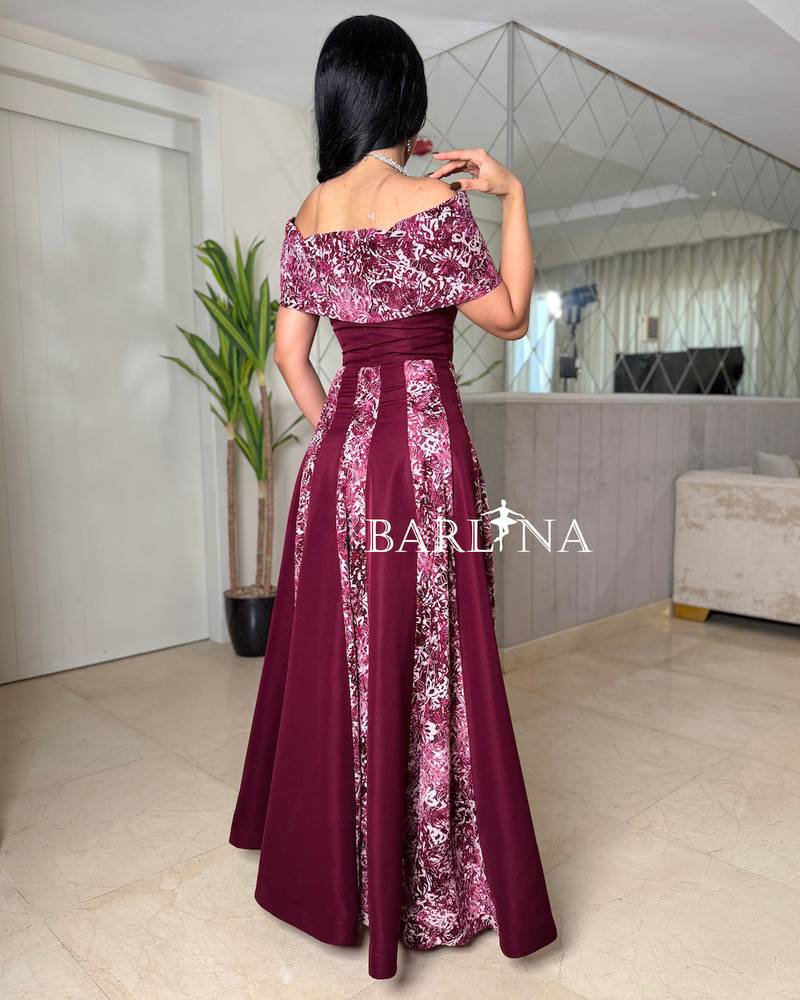 Off-shoulder burgundy dress embroidered with delicate patterns