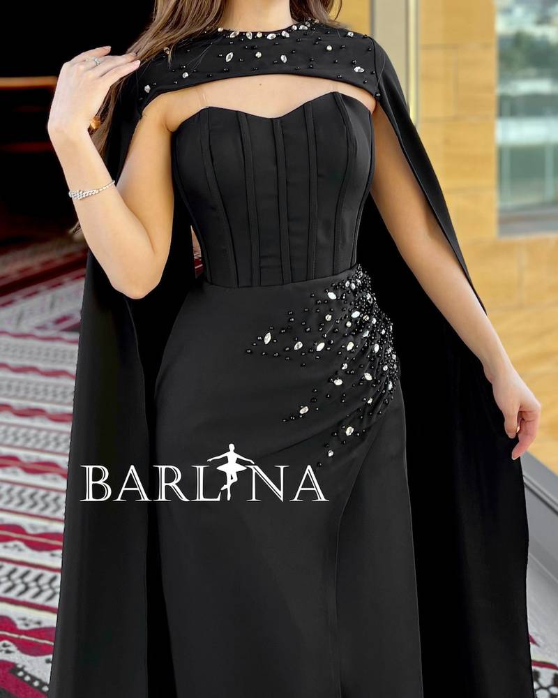 Black corset dress with shiny embroidery