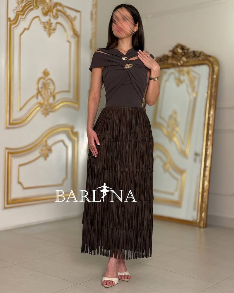Set with a skirt decorated with soft fringe