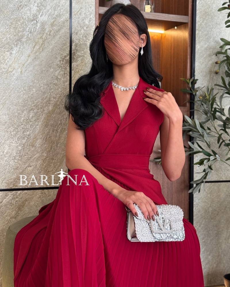 Classic red dress with elegant pleats