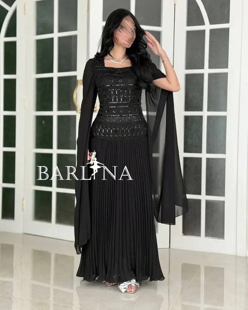 Dress with shimmering embroidery on the bodice