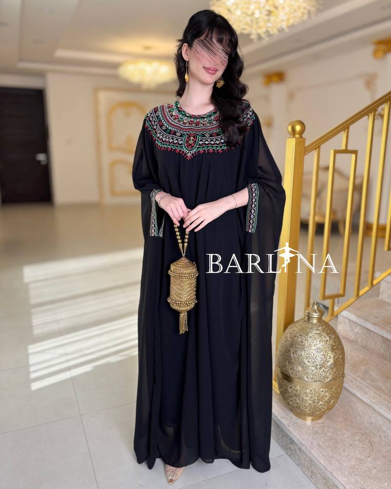 Jalabiya with colorful embroidery around the collar