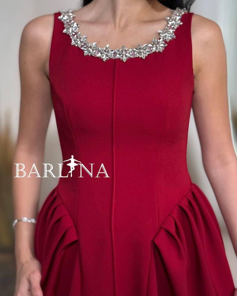 Red sleeveless midi dress with a studded collar