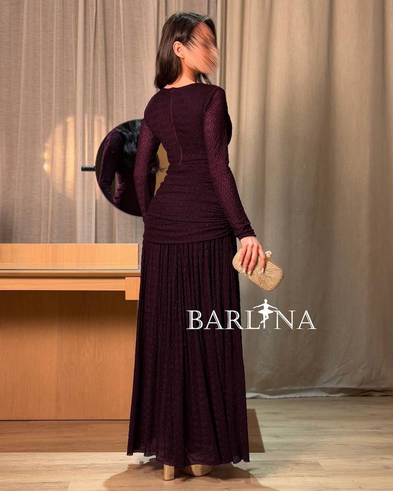 Elegant purple dress with patterned fabric
