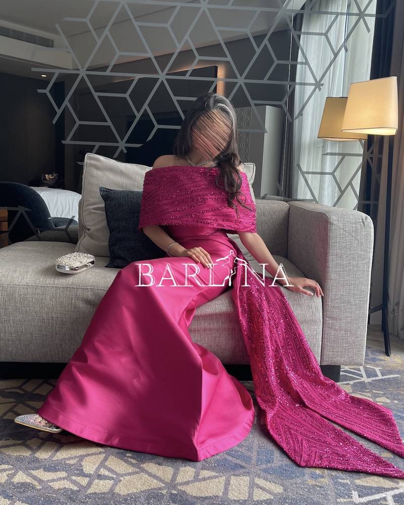 Fuchsia dress with a bow tail